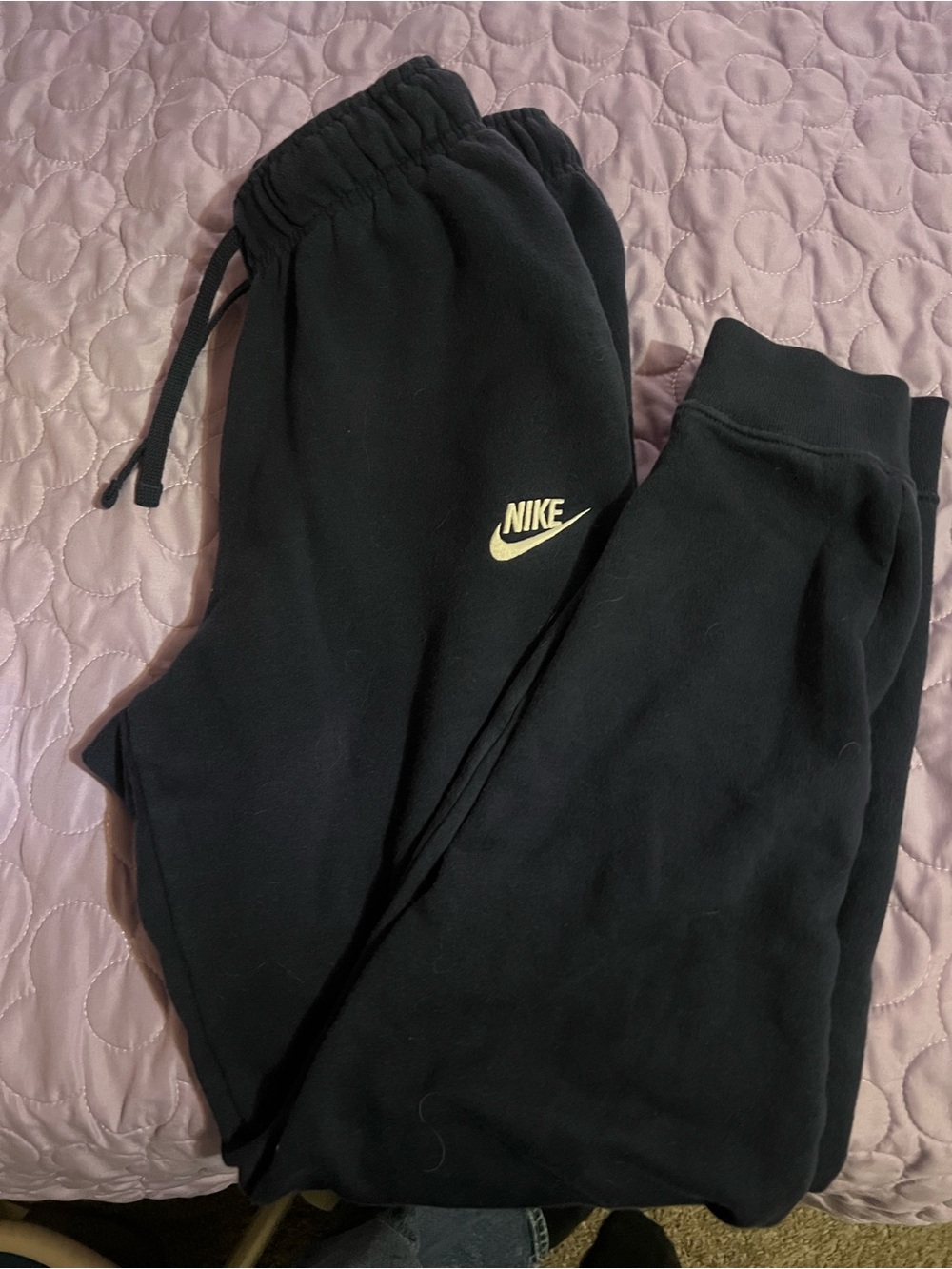 Nike Black Sweatpants with Gold Swoosh Logo